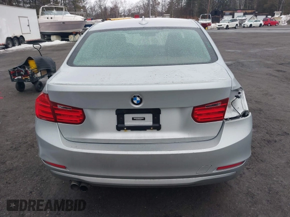 2013 BMW 3 Series 328i xDrive with VIN WBA3B5C58DF594087, listed as a IAAI auction lot 41710362 with 185,994 mi miles. Bid and sale history available at carsss.com. Image 14.