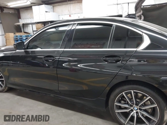 2020 BMW 3 Series 330i xDrive with VIN 3MW5R7J09L8B07302, listed as a IAAI auction lot 42592023 with 60,724 mi miles and . Bid and sale history available at DreamBid. Image 14.