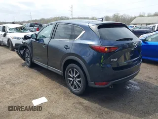 2018 Mazda CX-5 Grand Touring with VIN JM3KFBDM3J0377866, listed as a IAAI auction lot 41947014 with 70,446 mi miles. Bid and sale history available at carsss.com. Image 3.