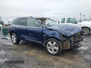 2012 Volkswagen Touareg Lux z VIN WVGEK9BP1CD009751, wystawiony jako IAAI lot #41240224 z przebiegiem Nie podano mil oraz . Historia ofert i sprzedaży dostępna na DreamBid. Obrazek 1.