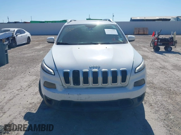 2016 Jeep Cherokee Latitude z VIN 1C4PJLCS0GW138381, wystawiony jako IAAI lot #41844589 z przebiegiem 100 991 mil mil oraz . Historia ofert i sprzedaży dostępna na DreamBid. Obrazek 12.
