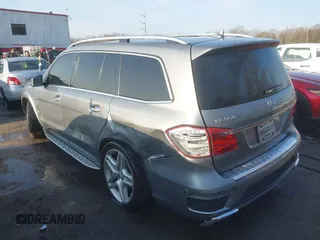 2016 Mercedes-Benz GL with VIN 4JGDF7DE3GA658765, listed as a IAAI auction lot 41416303 with 122,284 mi miles. Bid and sale history available at carsss.com. Image 3.
