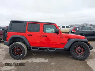 2020 Jeep Wrangler Unlimited Sport z VIN 1C4HJXDN8LW184653, wystawiony jako IAAI lot #41560198 z przebiegiem 64 880 mil mil oraz . Historia ofert i sprzedaży dostępna na DreamBid. Obrazek 14.