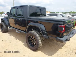 2021 Jeep Gladiator Willys with VIN 1C6HJTAG7ML514114, listed as a IAAI auction lot 42399793 with 78,829 mi miles and . Bid and sale history available at DreamBid. Image 3.