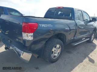 2010 Toyota Tundra 4WD Truck with VIN 5TFUW5F13AX138105, listed as a IAAI auction lot 41499018 with 295,414 mi miles. Bid and sale history available at carsss.com. Image 4.