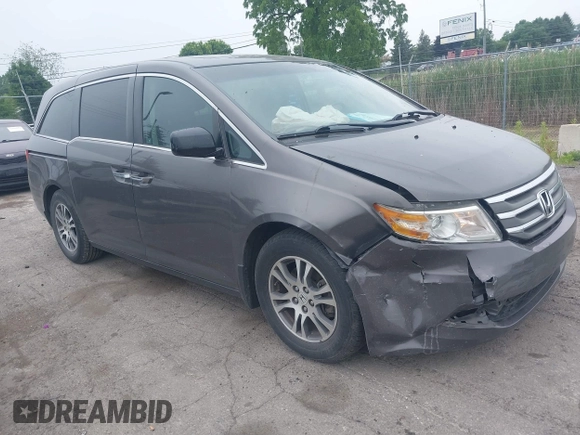 2011 Honda Odyssey EX-L with VIN 5FNRL5H64BB029087, listed as a IAAI auction lot 42508764 with 214,705 mi miles and . Bid and sale history available at DreamBid. Image 1.
