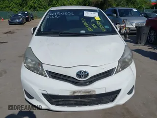 2014 Toyota Yaris L with VIN VNKJTUD35EA011933, listed as a IAAI auction lot 42150303 with 114,369 mi miles. Bid and sale history available at carsss.com. Image 6.
