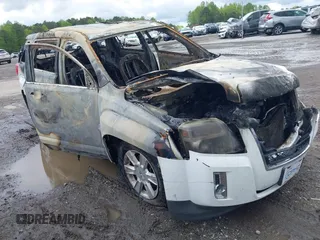 2011 GMC Terrain SLE-2 z VIN 2CTALSECXB6256316, wystawiony jako IAAI lot #42021063 z przebiegiem Nie podano mil oraz . Historia ofert i sprzedaży dostępna na DreamBid. Obrazek 1.
