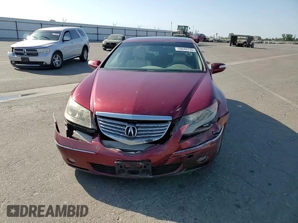 2007 Acura RL Technology z VIN JH4KB16677C004641, wystawiony jako Copart lot #59049755 z przebiegiem 176 704 mil mil oraz Szkoda całkowita • Salvage title. Historia ofert i sprzedaży dostępna na DreamBid. Obrazek 13.