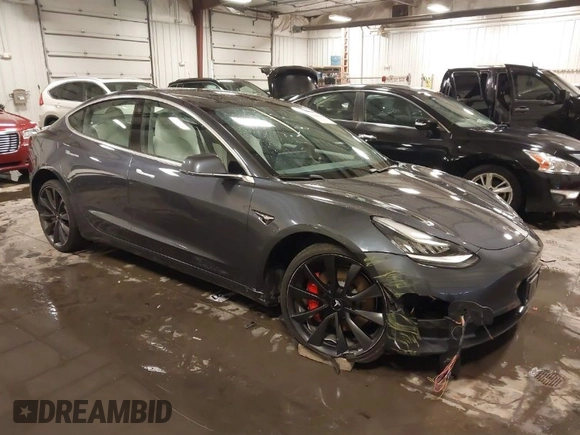 2020 Tesla Model 3 Performance z VIN 5YJ3E1EC3LF641768, wystawiony jako IAAI lot #41542615 z przebiegiem 43 343 mil mil oraz . Historia ofert i sprzedaży dostępna na DreamBid. Obrazek 1.
