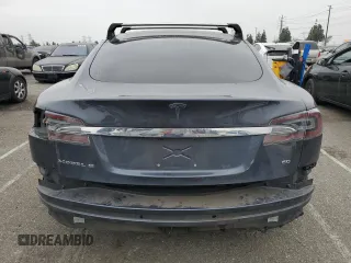 2014 Tesla Model S 60 with VIN 5YJSA1S14EFP56277, listed as a Copart auction lot 57162685 with Not provided miles and Salvage title. Bid and sale history available at DreamBid. Image 6.