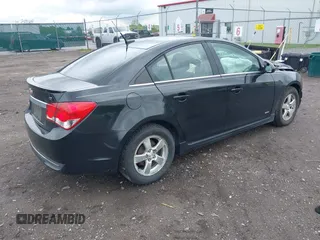 2014 Chevrolet Cruze 1LT z VIN 1G1PC5SB6E7138943, wystawiony jako IAAI lot #42368233 z przebiegiem 119 760 mil mil oraz . Historia ofert i sprzedaży dostępna na DreamBid. Obrazek 4.