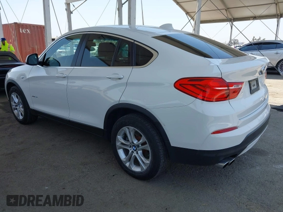 2015 BMW X4 xDrive28i with VIN 5UXXW3C5XF0M89259, listed as a IAAI auction lot 42553903 with 98,960 mi miles and . Bid and sale history available at DreamBid. Image 3.