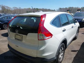 2014 Honda CR-V LX with VIN 5J6RM3H33EL027382, listed as a IAAI auction lot 41908781 with 208,642 mi miles. Bid and sale history available at carsss.com. Image 4.