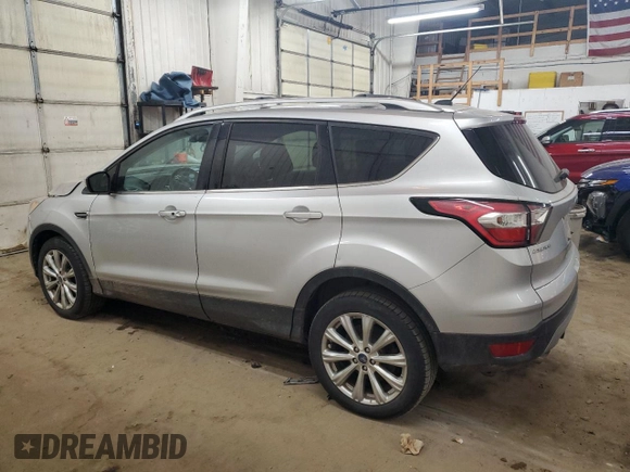 2017 Ford Escape Titanium with VIN 1FMCU0JD6HUE70200, listed as a Copart auction lot 49141595 with 92,159 mi miles and Salvage Title. Bid and sale history available at DreamBid. Image 2.