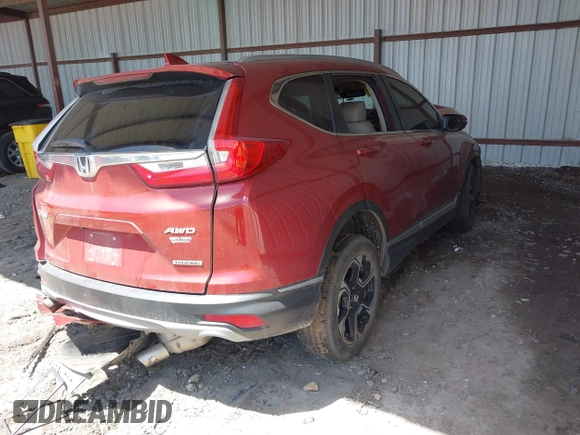 2018 Honda CR-V Touring with VIN 2HKRW2H92JH659660, listed as a IAAI auction lot 42266819 with 11 mi miles and . Bid and sale history available at DreamBid. Image 4.