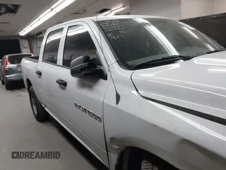 2012 Ram 1500 Tradesman with VIN 1C6RD6KP2CS280836, listed as a IAAI auction lot 40880119 with 84,748 mi miles and . Bid and sale history available at DreamBid. Image 13.