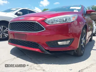 2016 Ford Focus SE z VIN 1FADP3F28GL237888, wystawiony jako IAAI lot #42564140 z przebiegiem 143 210 mil mil oraz . Historia ofert i sprzedaży dostępna na DreamBid. Obrazek 6.