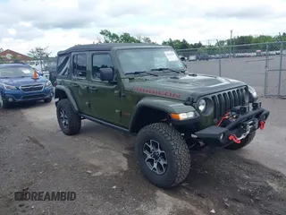 2022 Jeep Wrangler Unlimited Rubicon с VIN 1C4HJXFG5NW127263, выставлен на аукционе IAAI как лот 42224299 с пробегом 52 553 миль миль и . История ставок и продаж доступна на DreamBid. Изображение 1.