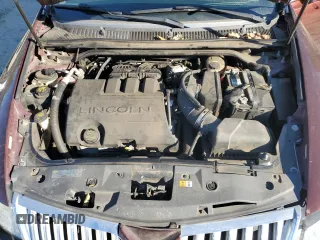 2012 Lincoln MKS with VIN 1LNHL9ER2CG802577, listed as a Copart auction lot 85455164 with 121,169 mi miles and Salvage Title. Bid and sale history available at DreamBid. Image 11.
