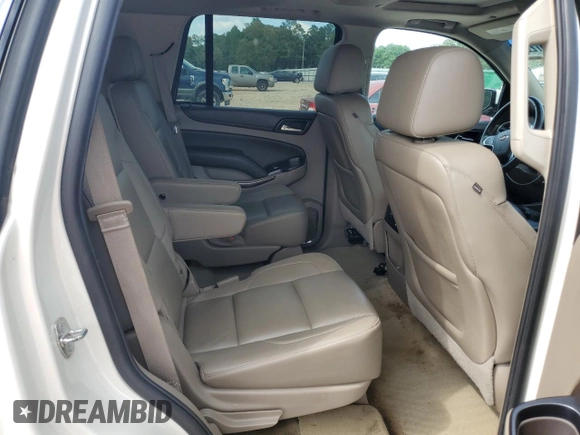 2015 Chevrolet Tahoe LT z VIN 1GNSCBKC5FR638002, wystawiony jako Copart lot #54857225 z przebiegiem 142 165 mil mil oraz Szkoda całkowita • Salvage title. Historia ofert i sprzedaży dostępna na DreamBid. Obrazek 11.