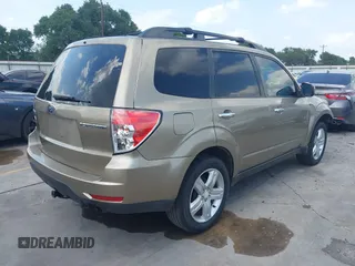 2009 Subaru Forester X Limited z VIN JF2SH64699H745428, wystawiony jako IAAI lot #42407890 z przebiegiem 131 716 mil mil oraz . Historia ofert i sprzedaży dostępna na DreamBid. Obrazek 4.