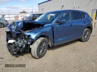 2021 Mazda CX-5 Touring with VIN JM3KFBCM5M0382279, listed as a Copart auction lot 51243185 with 46,982 mi miles and Salvage Title. Bid and sale history available at carsss.com. Image 1.