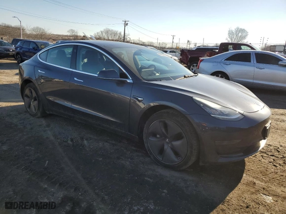 2020 Tesla Model 3 Standard Range Plus with VIN 5YJ3E1EA8LF597054, listed as a Copart auction lot 45152625 with 64,813 mi miles and Salvage Title. Bid and sale history available at carsss.com. Image 4.