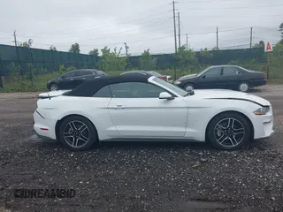 2022 Ford Mustang EcoBoost z VIN 1FATP8UH3N5104988, wystawiony jako IAAI lot #42320593 z przebiegiem 51 101 mil mil oraz . Historia ofert i sprzedaży dostępna na DreamBid. Obrazek 13.