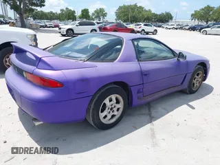 1999 Mitsubishi 3000GT z VIN JA3AM44H8XY003108, wystawiony jako IAAI lot #42374035 z przebiegiem 177 637 mil mil oraz . Historia ofert i sprzedaży dostępna na DreamBid. Obrazek 4.