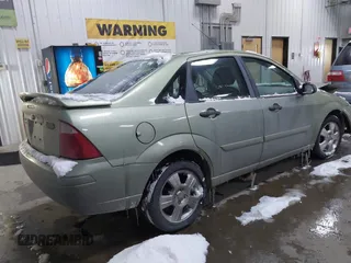 2007 Ford Focus S z VIN 1FAHP34N17W104080, wystawiony jako IAAI lot #41541274 z przebiegiem 106 938 mil mil oraz . Historia ofert i sprzedaży dostępna na DreamBid. Obrazek 4.