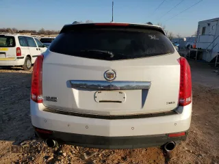 2016 Cadillac SRX Performance Collection с VIN 3GYFNCE3XGS561738, выставлен на аукционе Copart как лот 46920705 с пробегом 108 794 миль миль и Списание • Salvage title. История ставок и продаж доступна на DreamBid. Изображение 6.