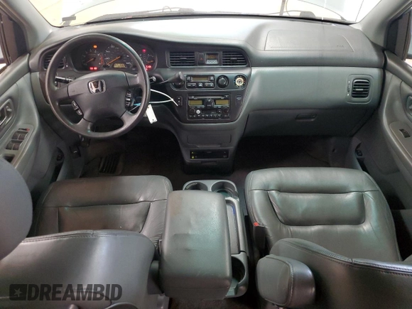 2004 Honda Odyssey EX-L z VIN 5FNRL18044B020316, wystawiony jako Copart lot #56027435 z przebiegiem 192 429 mil mil oraz Szkoda całkowita • Salvage title. Historia ofert i sprzedaży dostępna na DreamBid. Obrazek 8.