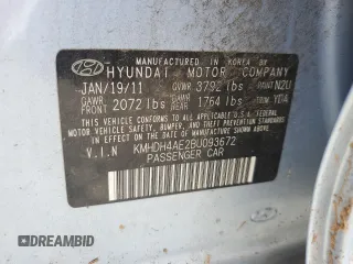 2011 Hyundai Elantra GLS z VIN KMHDH4AE2BU093672, wystawiony jako Copart lot #56977185 z przebiegiem 142 095 mil mil oraz Szkoda całkowita • Salvage title. Historia ofert i sprzedaży dostępna na DreamBid. Obrazek 13.