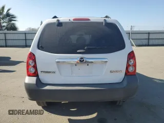 2005 Mazda Tribute i with VIN 4F2YZ02Z95KM24700, listed as a Copart auction lot 42002775 with 128,891 mi miles and Salvage Title. Bid and sale history available at carsss.com. Image 6.