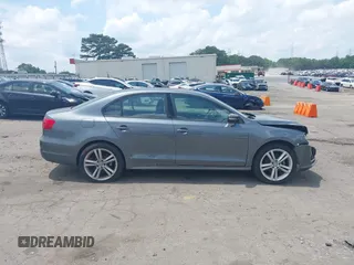 2014 Volkswagen Jetta SE with VIN 3VWD07AJ3EM232529, listed as a IAAI auction lot 42286442 with 125,000 mi miles and . Bid and sale history available at DreamBid. Image 13.