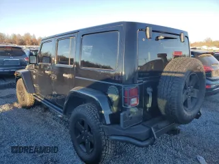 2012 Jeep Wrangler Unlimited Rubicon with VIN 1C4HJWFG1CL221083, listed as a Copart auction lot 80081654 with 163,912 mi miles and Salvage title. Bid and sale history available at DreamBid. Image 2.