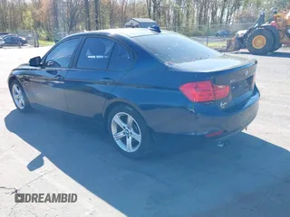 2013 BMW 3 Series 328i xDrive with VIN WBA3B3G54DNR80235, listed as a IAAI auction lot 42105883 with 144,023 mi miles. Bid and sale history available at carsss.com. Image 3.