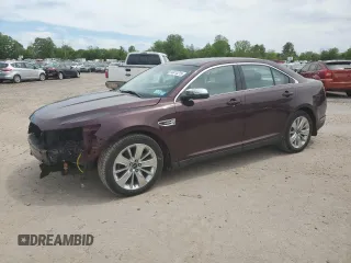 2011 Ford Taurus Limited z VIN 1FAHP2FW2BG173976, wystawiony jako Copart lot #58414215 z przebiegiem 84 433 mil mil oraz Szkoda całkowita • Salvage title. Historia ofert i sprzedaży dostępna na DreamBid. Obrazek 1.