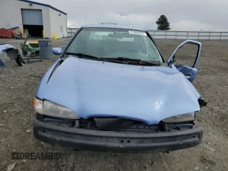 1995 Ford Contour z VIN 1FALP65L7SK244644, wystawiony jako Copart lot #51668445 z przebiegiem 100 085 mil mil oraz Szkody całkowita. Historia ofert i sprzedaży dostępna na DreamBid. Obrazek 5.