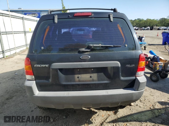 2004 Ford Escape XLS с VIN 1FMYU02194KB20656, выставлен на аукционе Copart как лот 54820755 с пробегом 107 447 миль миль и Списание • Salvage title. История ставок и продаж доступна на DreamBid. Изображение 6.