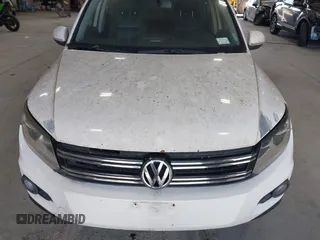 2012 Volkswagen Tiguan SE with VIN WVGAV7AXXCW533237, listed as a IAAI auction lot 42670923 with 227,323 mi miles and . Bid and sale history available at DreamBid. Image 12.