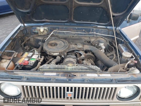 1986 Isuzu Trooper z VIN JACCH55L1G7801560, wystawiony jako IAAI lot #41878592 z przebiegiem 139 020 mil mil oraz . Historia ofert i sprzedaży dostępna na DreamBid. Obrazek 10.