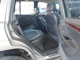 2000 Jeep Grand Cherokee Limited z VIN 1J4GW58N1YC206992, wystawiony jako IAAI lot #42057236 z przebiegiem 183 986 mil mil oraz . Historia ofert i sprzedaży dostępna na DreamBid. Obrazek 8.