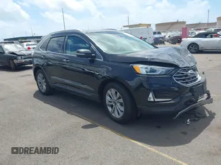 2019 Ford Edge Titanium z VIN 2FMPK3K98KBB22379, wystawiony jako IAAI lot #41937060 z przebiegiem 56 891 mil mil oraz . Historia ofert i sprzedaży dostępna na DreamBid. Obrazek 1.