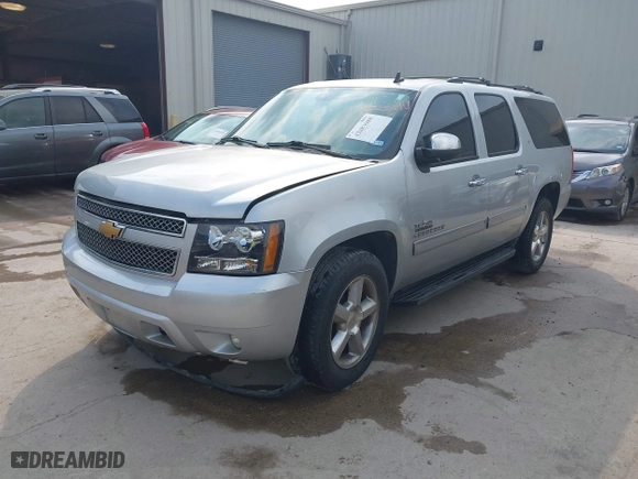 2013 Chevrolet Suburban LT with VIN 1GNSCJE03DR164477, listed as a IAAI auction lot 42083985 with 150,540 mi miles. Bid and sale history available at carsss.com. Image 16.
