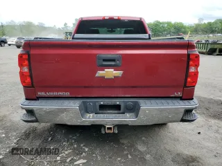2018 Chevrolet Silverado 1500 LT with VIN 1GCVKRECXJZ255744, listed as a Copart auction lot 55957495 with 75,753 mi miles and Salvage Title. Bid and sale history available at DreamBid. Image 6.