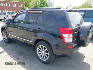 2013 Suzuki Grand Vitara Limited z VIN JS3TD0D7XD4100356, wystawiony jako IAAI lot #42250142 z przebiegiem 124 912 mil mil oraz . Historia ofert i sprzedaży dostępna na DreamBid. Obrazek 3.
