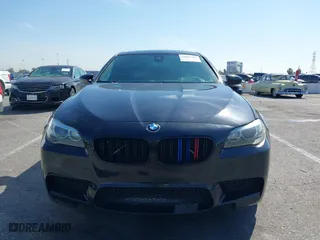 2013 BMW M5 with VIN WBSFV9C54DC772568, listed as a IAAI auction lot 41866486 with 99,072 mi miles. Bid and sale history available at carsss.com. Image 6.