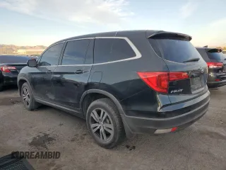 2016 Honda Pilot EX-L with VIN 5FNYF6H72GB106385, listed as a Copart auction lot 44000395 with 128,520 mi miles and Salvage Title. Bid and sale history available at carsss.com. Image 2.